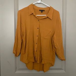 Super cute orange blouse for winter look
